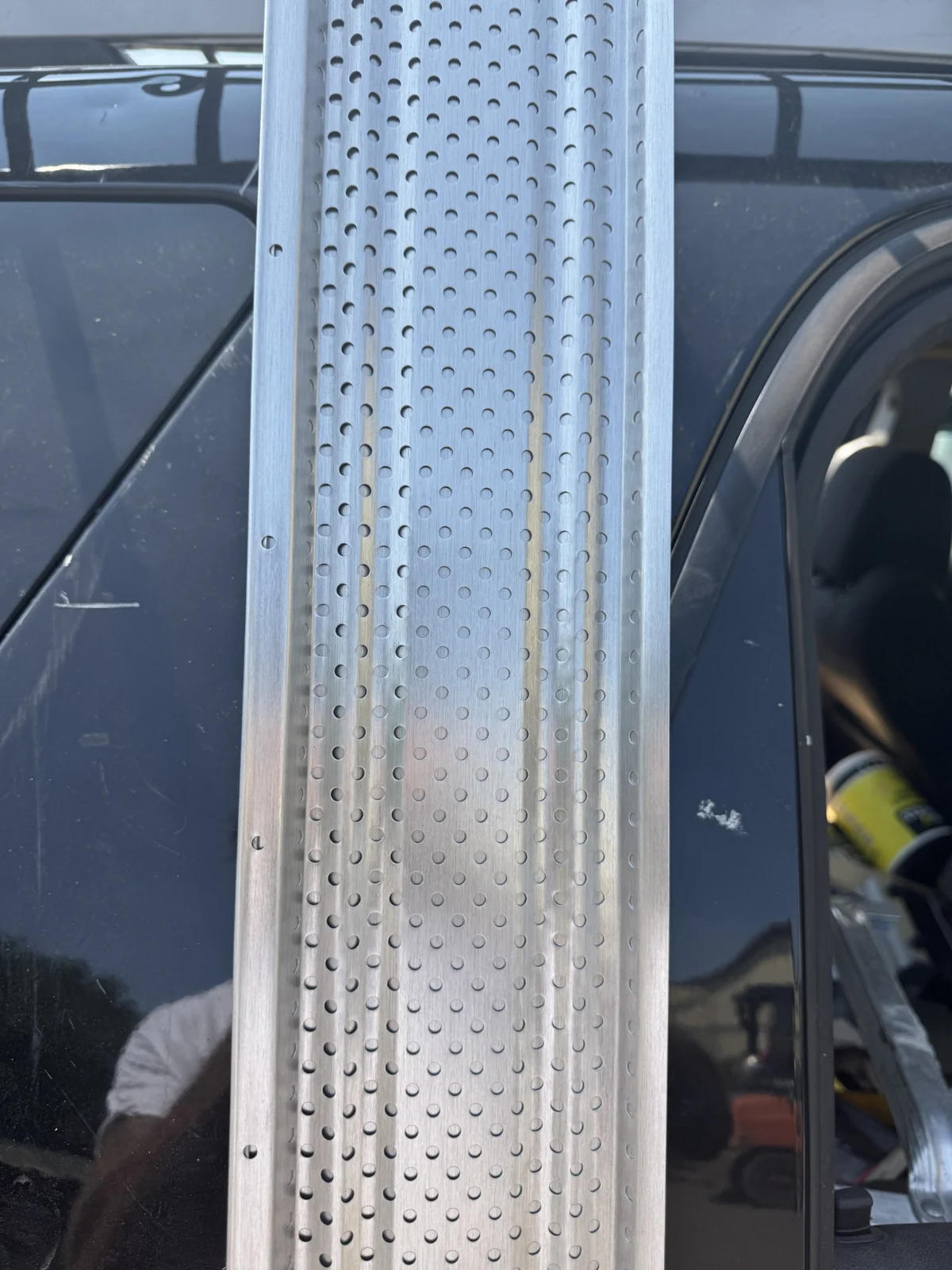 Close-up of a perforated Shur Flo leaf guard panel